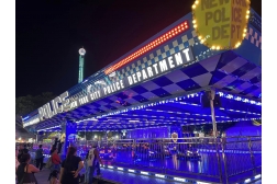 How do RGB lights affect the atmosphere and visitor experience of an amusement park?